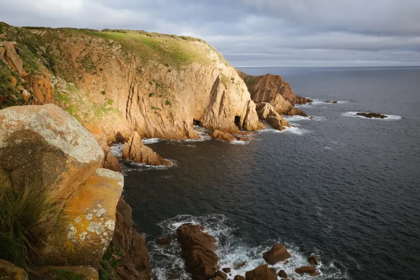Coastal cliffs above a grey sea on Phillip Island